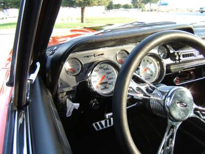 Over sized white Autometer Phantom Gauges have been installed in the custom Deluxe instrument bezel. These really make the dash "pop".