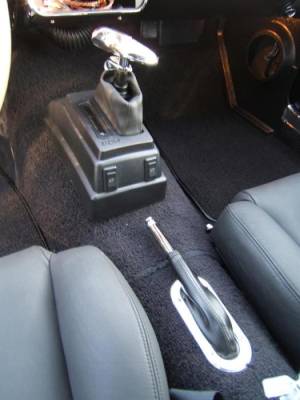 B&M "Hammer" auto transmission shifter. You will also notice the custom e-brake handle installed on the drive line tunnel, just another little custom feature.