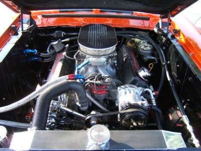 Most of the wiring has been rerouted through the frame rails and under the fenders and out of sight for a cleaner engine compartment.