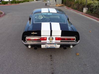 Beautiful black on black with white stripes, it has the look and feel of a true Muscle Car