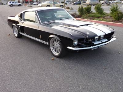Black on black 1967 Mustang Fastback